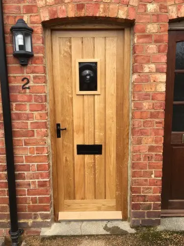 Bespoke Oak External Door with a Glass Bullion Aperture image