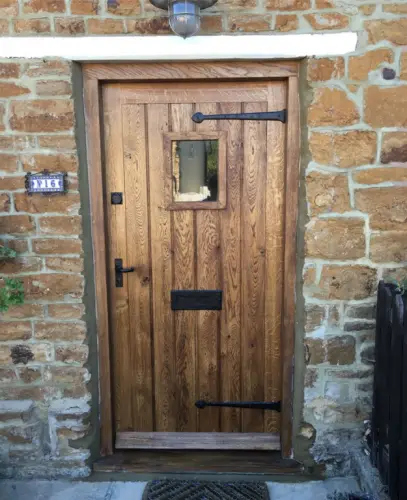 Bespoke Oak Door with Glazed Aperture 
- Medium Oak Finish image
