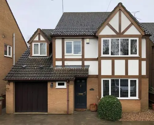 Tudor Cladding using Accoya Timber. Finished in Medium Oak stain image