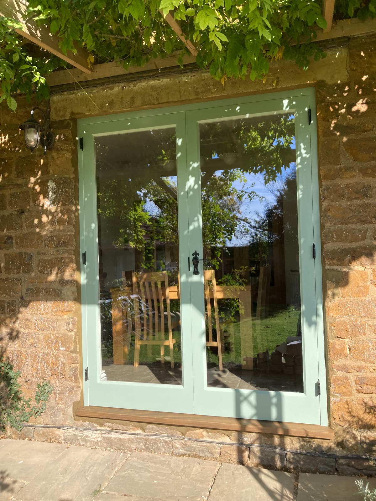 French Doors
Manufactured from Accoya
Finished in White Top Coat (Inside)
Chartwell Green (Outside)
From the Anvil Black Ironmongery
14mm Heritage Planitherm Unit image